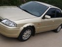 Ford Laser Delu 2001 - Cần bán xe Ford Laser Delu năm 2001, màu vàng