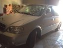 Kia Carnival   2005 - Bán xe Kia Carnival đời 2005, màu bạc 