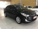 Hyundai Acent 1.4 2012 - Cần bán Hyundai Acent 1.4 năm 2012, màu đen, xe nhập, xe gia đình