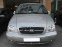 Kia Carnival GS 2009 - Cần bán gấp Kia Carnival GS 2009, màu bạc, giá chỉ 355 triệu