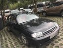 Kia Spectra 2004 - Cần bán xe Kia Spectra 2004, màu đen, xe nhập, 170 triệu