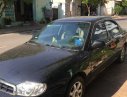 Kia Spectra 2005 - Bán xe Kia Spectra sản xuất năm 2005, màu đen, xe nhập, giá chỉ 130 triệu