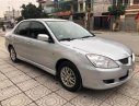 Mitsubishi Lancer 2004 - Bán ô tô Mitsubishi Lancer năm sản xuất 2004, màu bạc chính chủ, giá tốt