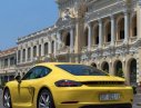 Porsche Cayman 718 2017 - Cần bán lại xe Porsche Cayman 718 2017, màu vàng, nhập khẩu nguyên chiếc như mới