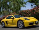 Porsche Cayman 718 2017 - Cần bán lại xe Porsche Cayman 718 2017, màu vàng, nhập khẩu nguyên chiếc như mới