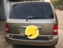 Kia Carnival 2009 - Bán Kia Carnival 2009, màu vàng  