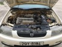 Mazda 323 MT 2000 - Bán xe Mazda 323 MT năm sản xuất 2000, màu trắng