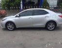 Toyota Corolla   1.8G   2015 - Bán Toyota Corolla 1.8G năm 2015, màu bạc xe gia đình, 645tr