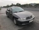 Mitsubishi Lancer GLXI 1.6 MT 2003 - Bán Mitsubishi Lancer GLXI 1.6 MT đời 2003, màu xám số sàn giá cạnh tranh