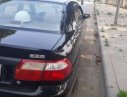 Mazda 323F 2001 - Cần bán Mazda 323F đời 2001, màu đen chính chủ, giá tốt