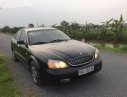 Daewoo Magnus 2004 - Bán Daewoo Magnus đời 2004, màu đen số tự động