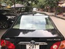 Toyota Corona  G 1.8  2004 - Cần bán gấp Toyota Corona G 1.8 sản xuất 2004, màu đen số sàn