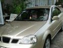 Daewoo Lacetti 2004 - Cần lên 7 chỗ bán Daewoo Lacetti đời 2004, màu vàng