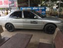 Mitsubishi Lancer GLXI 2001 - Đang có nhu cầu bán Lancer GLXI 2001, màu bạc