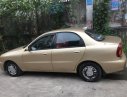 Daewoo Lanos 1.5MT 2003 - Cần bán xe Daewoo Lanos SX năm 2003, màu vàng, nhập khẩu nguyên chiếc