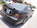 Daewoo Magnus 2.0 MT 2004 - Chính chủ bán Daewoo Magnus 2.0 MT 2004, màu đen