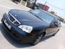 Daewoo Magnus 2.0 MT 2004 - Chính chủ bán Daewoo Magnus 2.0 MT 2004, màu đen