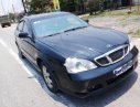 Daewoo Magnus 2.0 MT 2004 - Chính chủ bán Daewoo Magnus 2.0 MT 2004, màu đen