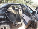 Mazda 323 2004 - Cần bán lại xe Mazda 323 2004, màu đen chính chủ, 139tr