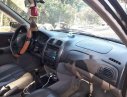 Mazda 323 2004 - Cần bán lại xe Mazda 323 2004, màu đen chính chủ, 139tr