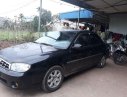 Kia Spectra 2004 - Cần bán xe Kia Spectra 2004, màu đen, 105tr