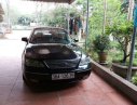 Ford Mondeo 2004 - Cần bán Ford Mondeo đời 2004, màu đen, 250 triệu