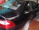 Mazda 626 2004 - Chính chủ bán lại xe Mazda 626 sản xuất năm 2004, màu đen, nhập khẩu