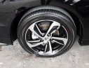Honda Odyssey 2.4AT  2017 - Cần bán gấp Honda Odyssey 2.4AT sản xuất 2017, màu đen, xe nhập