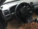 Mazda 323 1999 - Bán Mazda 323 năm sản xuất 1999, màu đen, giá 130tr