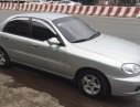 Daewoo Lanos SX 2005 - Cần bán Daewoo Lanos SX năm sản xuất 2005, màu bạc xe gia đình