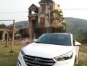 Hyundai Tucson 2016 - Cần bán gấp Hyundai Tucson sản xuất năm 2016, màu trắng chính chủ, 860tr