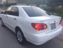 Toyota Corolla LE 1.8 2005 - Cần bán lại xe Toyota Corolla LE 1.8 năm 2005, màu trắng, nhập khẩu nguyên chiếc 