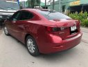 Mazda 323 1.5 AT 2016 - Bán xe Mazda 323 1.5 AT sản xuất năm 2016, màu đỏ