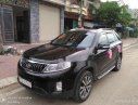 Kia Sorento 2014 - Cần bán Kia Sorento sản xuất năm 2014, màu đen đẹp như mới, 710tr