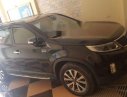 Kia Sorento 2014 - Cần bán Kia Sorento sản xuất năm 2014, màu đen đẹp như mới, 710tr