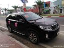 Kia Sorento 2014 - Cần bán Kia Sorento sản xuất năm 2014, màu đen đẹp như mới, 710tr