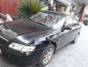 Mazda 626 2001 - Cần bán xe Mazda 626 đời 2001, màu đen chính chủ, 135tr