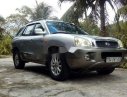 Hyundai Santa Fe   2003 - Chính chủ cần bán Hyundai Santa Fe đời 2003, màu bạc