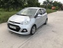 Hyundai i10 2014 - Bán Hyundai i10 2014, màu bạc xe gia đình