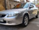 Mazda 323 2004 - Bán Mazda 323 2004, màu bạc xe gia đình  