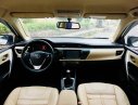 Toyota Corolla altis 1.8MT 2015 - Cần bán xe Toyota Altis 2015 số sàn, màu trắng