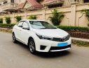 Toyota Corolla altis 1.8MT 2015 - Cần bán xe Toyota Altis 2015 số sàn, màu trắng
