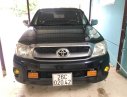 Toyota Hilux E 2009 - Bán ô tô Toyota Hilux E sản xuất năm 2009, màu đen, nhập khẩu