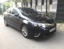 Toyota Corolla altis  G 2014 - Bán Toyota Corolla Altis G đời 2015 số sàn, màu đen