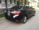 Toyota Corolla altis  G 2014 - Bán Toyota Corolla Altis G đời 2015 số sàn, màu đen