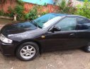 Mazda 323   1999 - Bán ô tô Mazda 323 năm 1999, màu đen giá rẻ