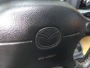 Mazda 323   1999 - Bán ô tô Mazda 323 năm 1999, màu đen giá rẻ