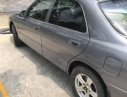 Mazda 626 1995 - Cần bán gấp Mazda 626 năm sản xuất 1995, màu xám chính chủ