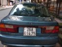 Mazda 323 MT  1997 - Cần bán gấp Mazda 323 MT sản xuất năm 1997, màu xanh lam