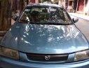 Mazda 323 MT  1997 - Cần bán gấp Mazda 323 MT sản xuất năm 1997, màu xanh lam